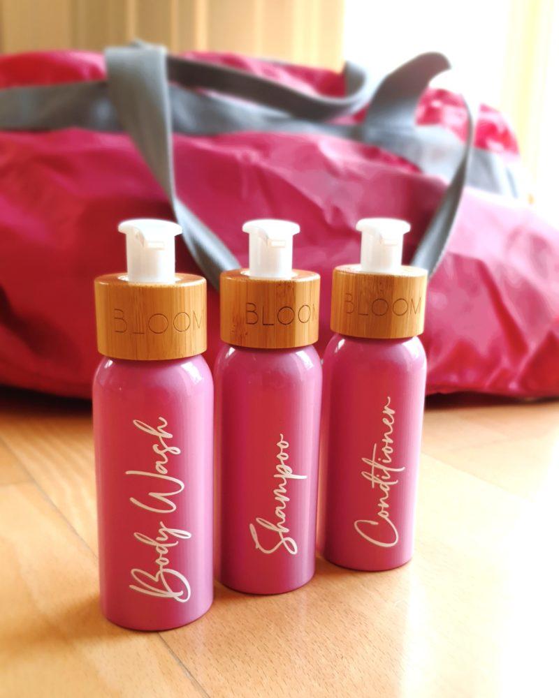 BLOOM Refillable pink ecofriendly travel bottle set for toiletries