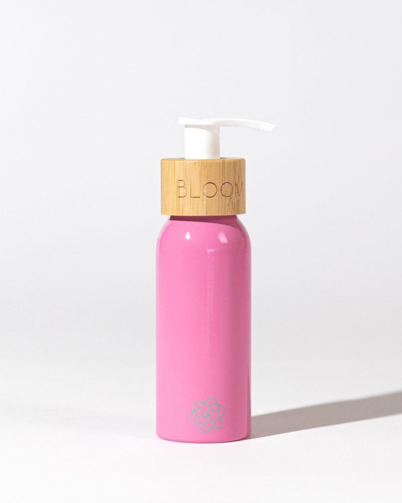 BLOOM Refillable pink ecofriendly travel bottle for toiletries
