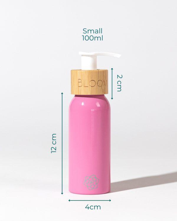 BLOOM Wiederbefüllbare rosa ökologische Reiseflasche für Körperpflegeprodukte