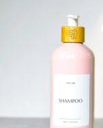 Pink refillable shampoo bottle
