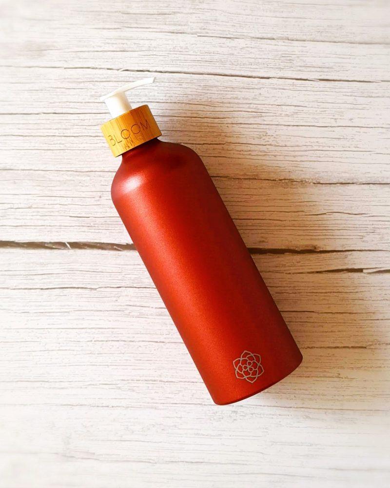 Metallic red refillable soap dispenser with natural bamboo pump