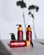 Portable and stylish 100ml forever-bottles metallic red. With personalized initials. Perfect for sustainable travel.