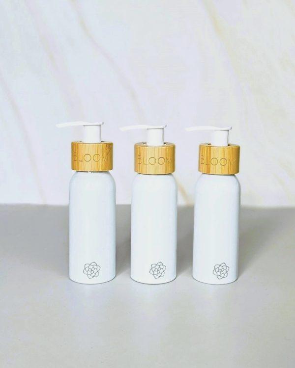 BLOOM Refillable white ecofriendly travel bottle for toiletries