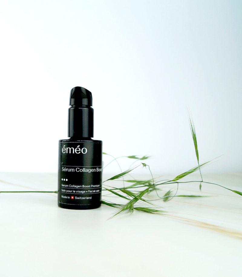bottle of BLOOM collagen serum showcased alongside a plant, epitomizing natural skincare.