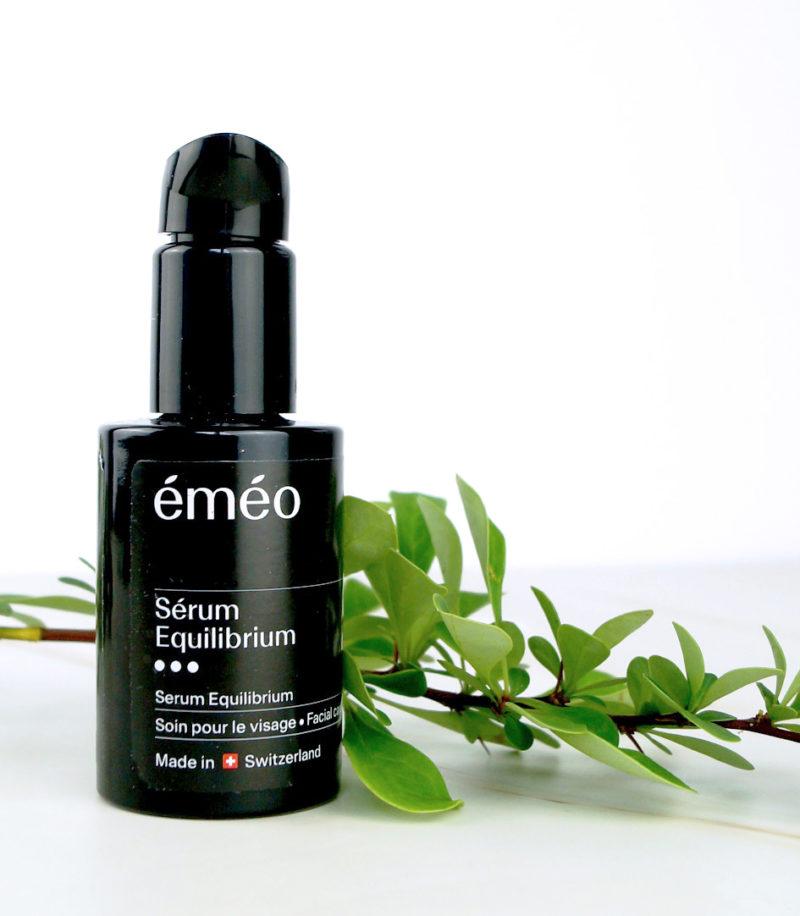 A glass bottle of BLOOM natural skincare serum for acne prone skin.